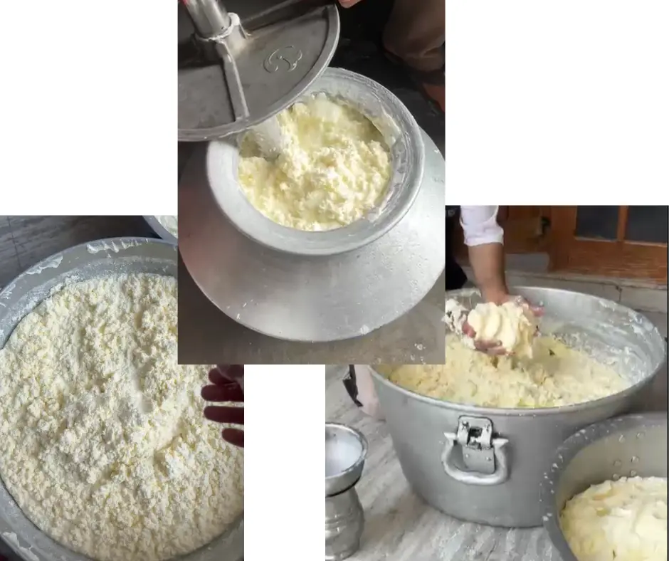 Hand churning curd with a wooden mathani — Bilona